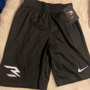 * NWT Nike 3Brand by Russell Wilson Boys performance badge mesh shorts Medium